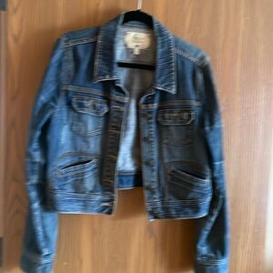 Dark blue jeans jacket with buttons